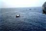 Boats Coming out to Us at Anchor